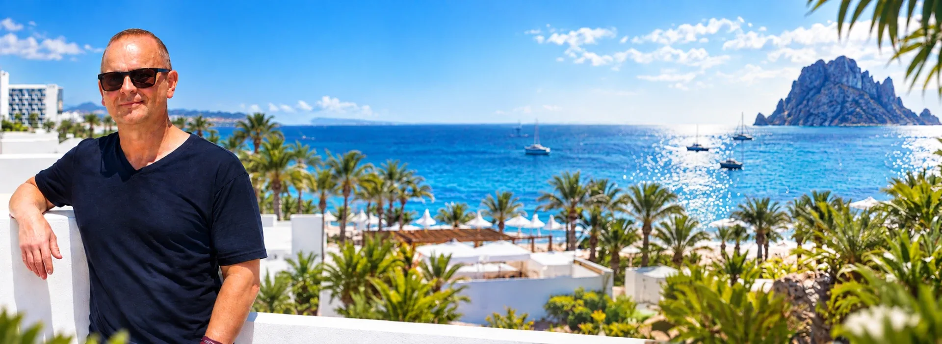 Marc Maris on a terrace overlooking the sea and Es Vedrà in Ibiza